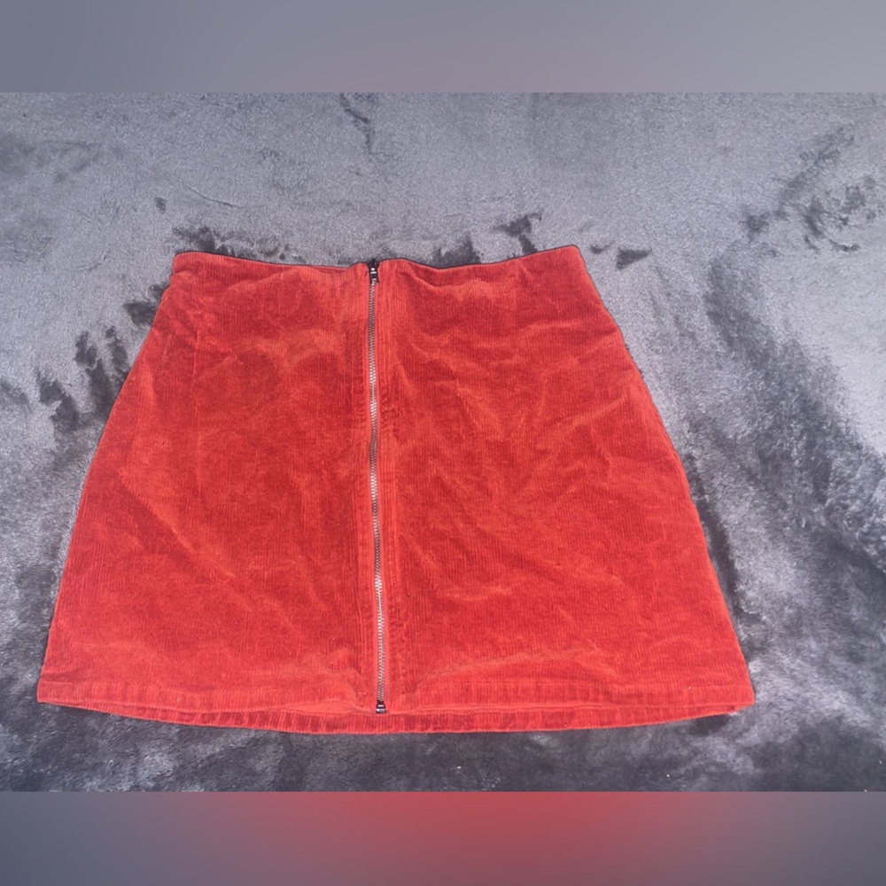 Burnt orange zip up skirt in very good condition.    •smoke free home •